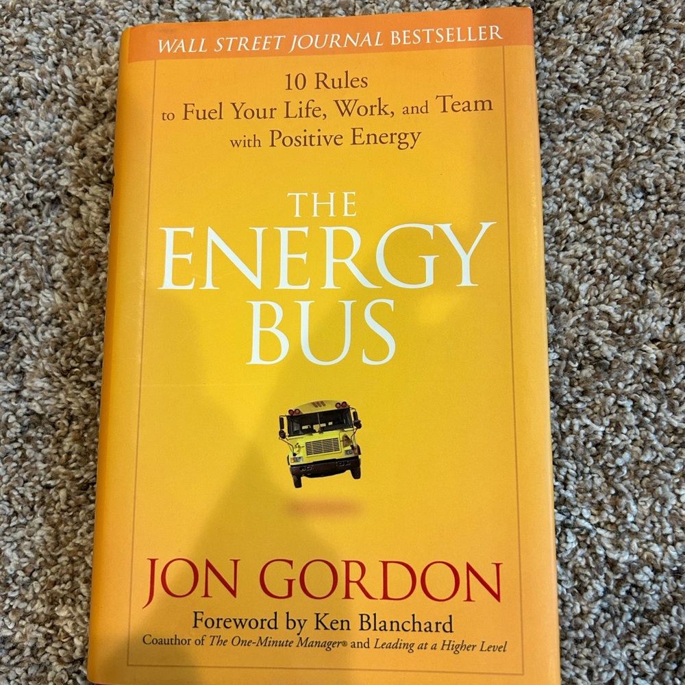 The Energy Bus by Jon Gordon - Bright Yellow hardcover book